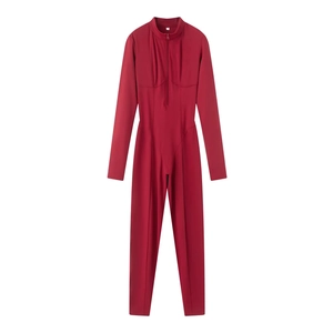 Detail view of the deep red jumpsuit featuring long sleeves and a front zipper closure