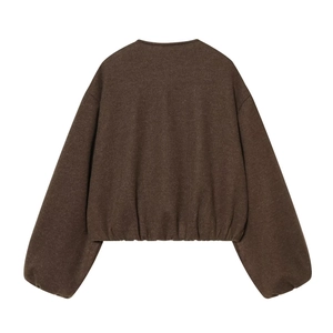 Détail du dos d'un blouson aviateur marron foncé avec coutures et ourlet élastique