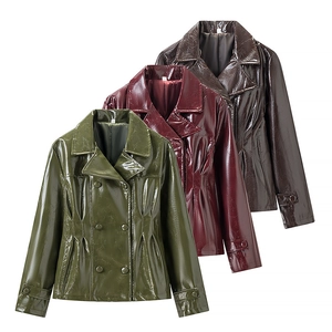 Flat lay of glossy PU leather jackets in olive, burgundy, and brown showing texture