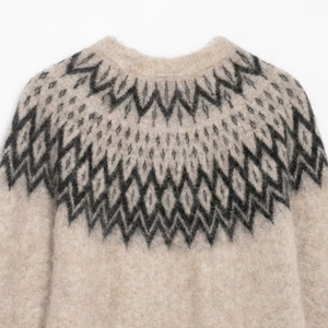 Winter beige mohair knit sweater with black geometric jacquard pattern and crew neck