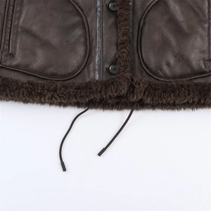 Detail of coffee leather jacket with faux shearling lining, button closure and drawstring