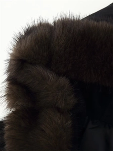 Macro shot of high-quality dark brown faux fur collar with lush and fluffy texture