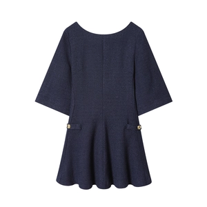 Elegant navy blue tweed dress featuring a boat neck and decorative gold buttons