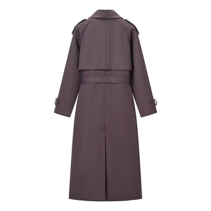 Detail of double-breasted trench coat back with epaulettes and matching belt