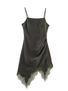 Detail of the olive green satin lace camisole top with intricate lace hem and thin straps