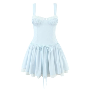 Detail of light blue dress showing bust ruffles with white lace trim and small bow