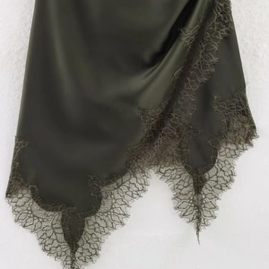 Deep olive green satin camisole top with intricate lace trim edges and silky texture finish