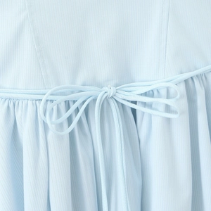 Light blue slim fit dress with French vintage bow tie and elegant pleated waist detail