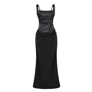 Detail of black satin long dress featuring corset bodice and ruched waist textures