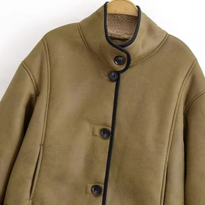 Olive green faux suede jacket with thick lamb wool lining and black binding contrast
