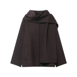 Detail of deep brown wool jacket featuring an elegant scarf-style collar and textured fabric