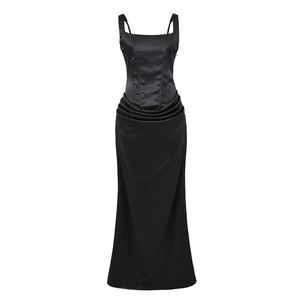Elegant black satin corset maxi dress with slender spaghetti straps and a flowing skirt