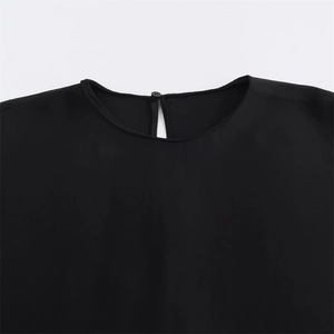 Women's minimalist black crew neck blouse with back button closure detail