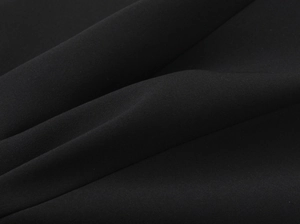 Close-up showing the fine texture and drape of black floral bandeau top fabric