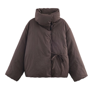 Detail of dark brown silhouette jacket with stand collar and side tie-up closure detail