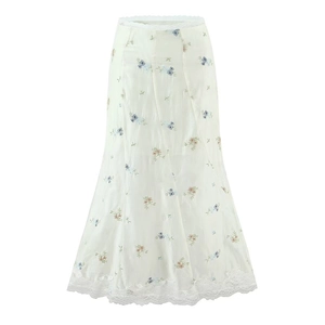 Elegant white floral maxi skirt with lace trim featuring pastel flower embroidery