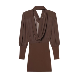 Detailed view of deep brown dress with elegant cowl neckline and sheer long sleeves