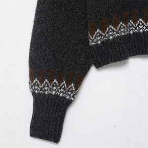 Pull vintage en laine gris foncé avec motif Fair Isle et poignets en tricot côtelé