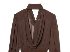Detail showing elegant chocolate brown chiffon top with deep V-neck and draped pleats