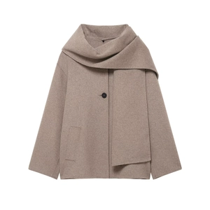 Detailed view of single button closure and waist pockets on taupe wool blend coat