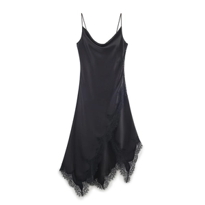 Detail of cowl neck and thin straps on black satin dress with delicate lace hem