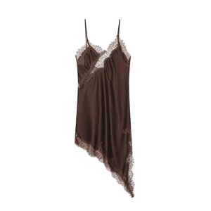 Close-up of the smooth dark brown silk fabric with delicate lace trim on the hem
