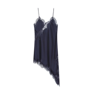 Detail of navy blue lace camisole dress featuring asymmetric hem and silky fabric texture