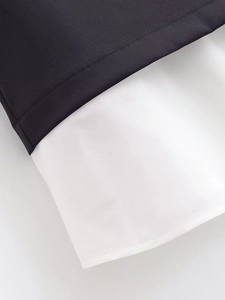 Detail der kontrastreichen schwarz-weißen Patchwork-Stoffe mit präziser Nahtverarbeitung