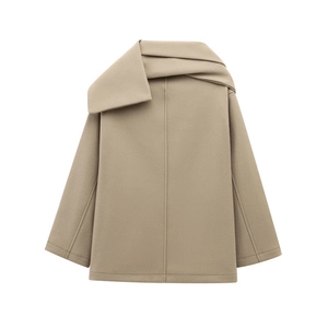 Close-up of oatmeal wool blend coat featuring scarf-style collar and a loose silhouette