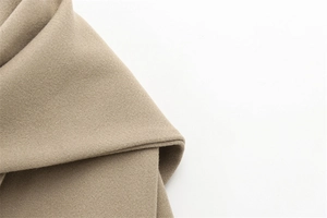 Detailed close-up showing the premium wool blend texture of the khaki autumn jacket