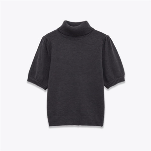 Close-up of charcoal grey high collar knitwear with ribbed hem and puff sleeve details