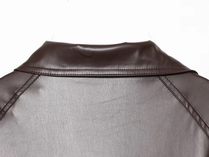 Detailed view of the double-stitched back collar on a dark brown faux leather trench coat