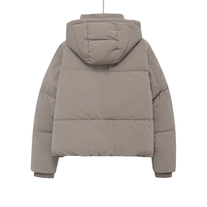 Detail view of taupe padded winter jacket featuring a hood and horizontal quilting