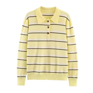 Close-up of yellow striped knit sweater featuring a polo collar and brown buttons