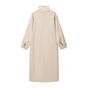 Back view of a long beige wool blend coat with high collar and oversized silhouette