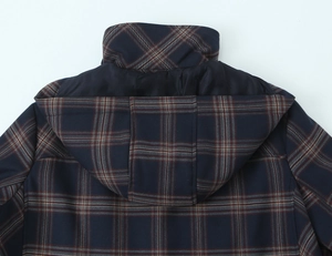Detail view of navy blue plaid hooded jacket focusing on the hood and back stitching