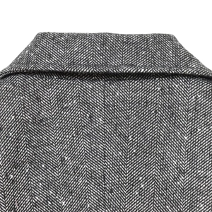 Women's slim fit blazer jacket featuring premium black and white herringbone wool fabric