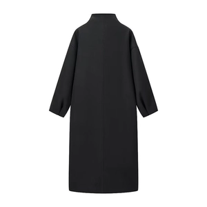 Back view of a minimalist black long coat featuring drop shoulder design and sleek texture
