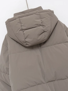 Back view of earth-tone hooded puffer jacket with wide horizontal quilted stitching details
