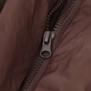 Winter puffer jacket in chocolate brown featuring a matching resin zipper and satin finish