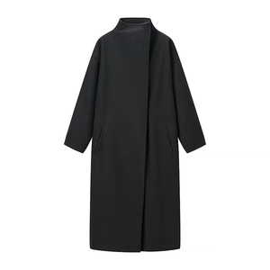Elegant women's minimalist black wool coat featuring a stand collar and loose silhouette