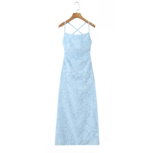 Detail of light blue floral jacquard dress with crisscross back and thin straps