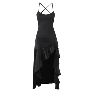 Detailed view of black satin slip dress featuring ruffle hem and spaghetti straps