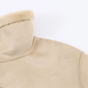 Detail shot of the plush faux fur collar and camel suede fabric of the winter jacket
