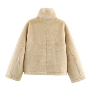 Back view of a cropped beige shearling jacket with high collar and soft texture