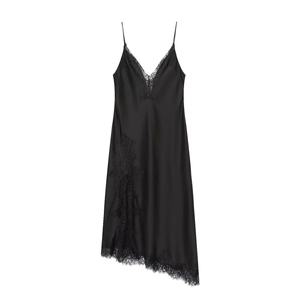 Detailed view of black satin slip dress with intricate lace trim and slim straps