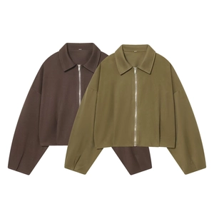 Detailed view of collared zip-up jackets in dark coffee and olive green colors