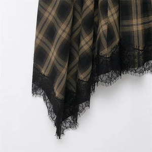 Vintage plaid midi skirt with black lace hem detailing in classic brown and beige tones