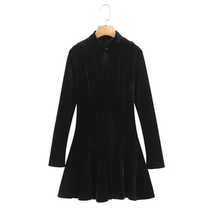 Elegant black velvet long-sleeve dress with keyhole neckline and slim-fit A-line silhouette