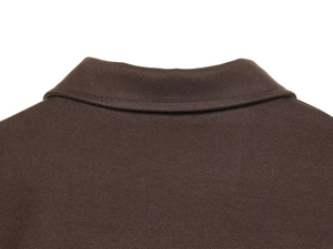 Close-up of premium dark brown wool jacket collar showing detailed stitching and fabric